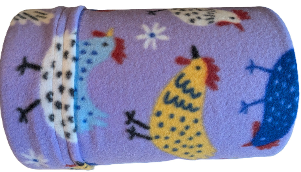 Chickens on purple tube.jpg